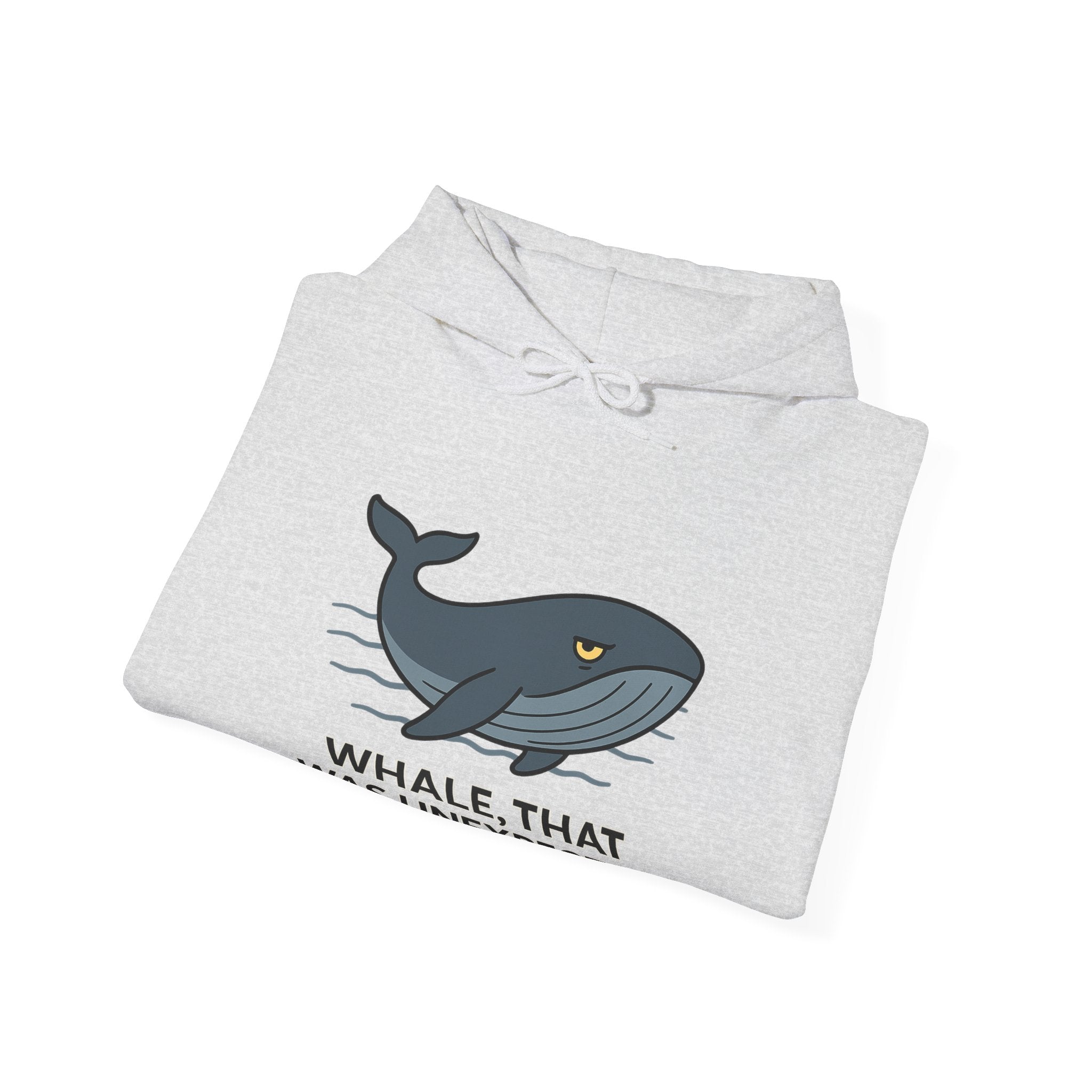 Folded gray hoodie with a blue whale graphic and text "whale, that was unexpected" by Soon To Be Mythical