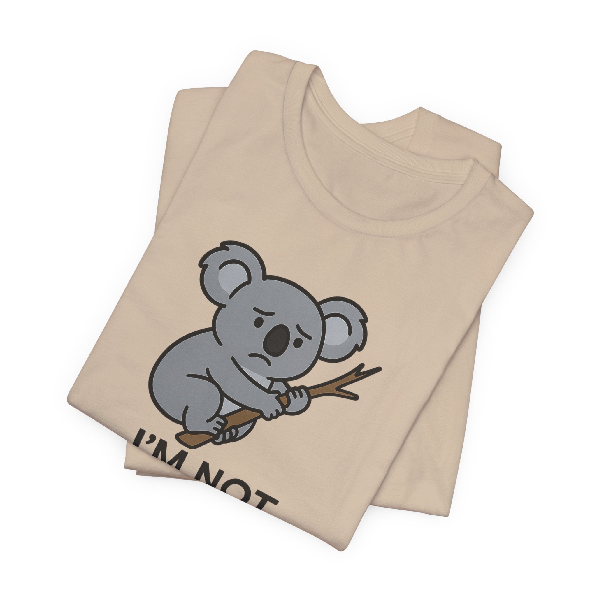 Tan t-shirt with a koala graphic and text "I'm not koala-fied for this" on a white background