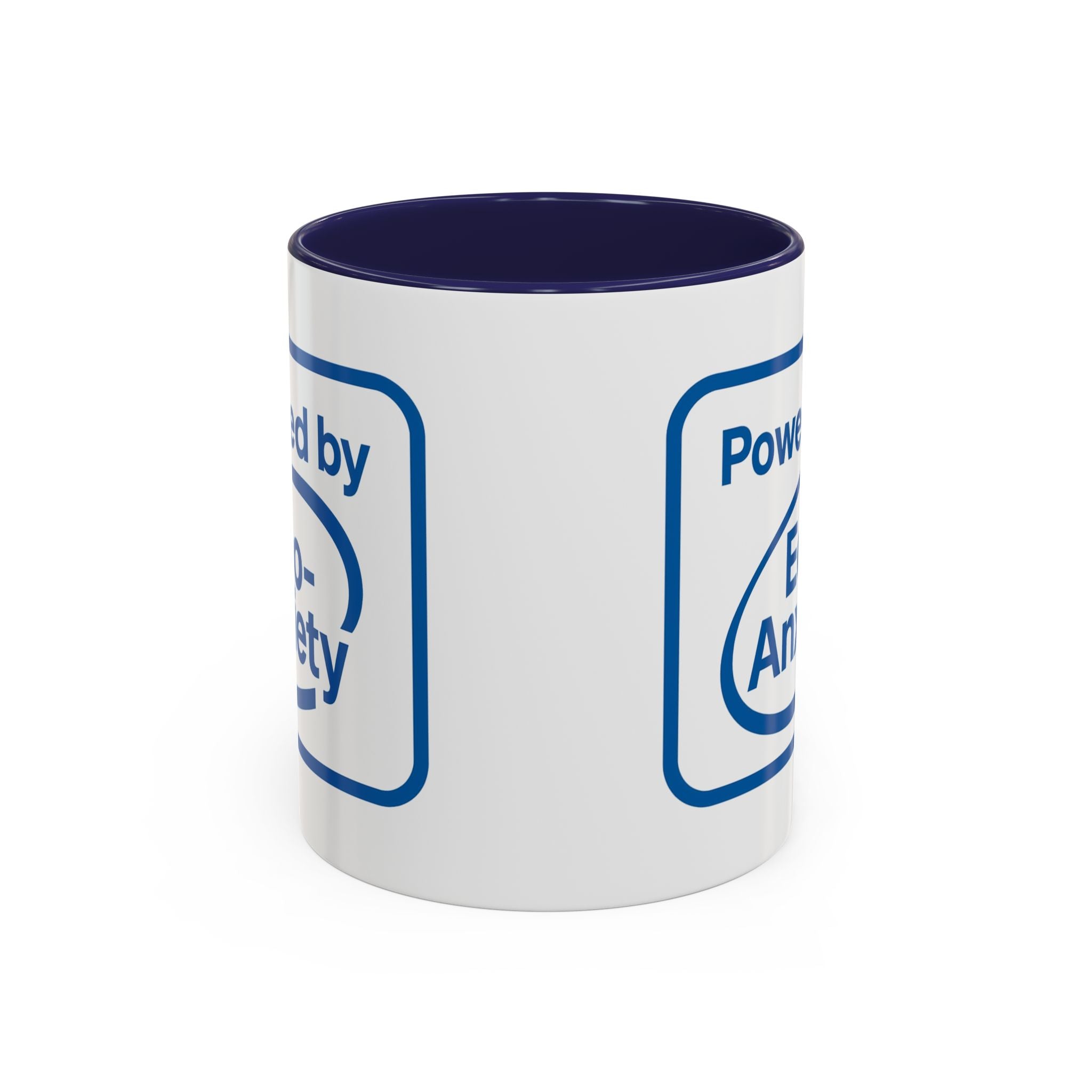 White coffee mug with navy blue accent interior and handle with a graphic that says "Powered by Eco-anxiety"