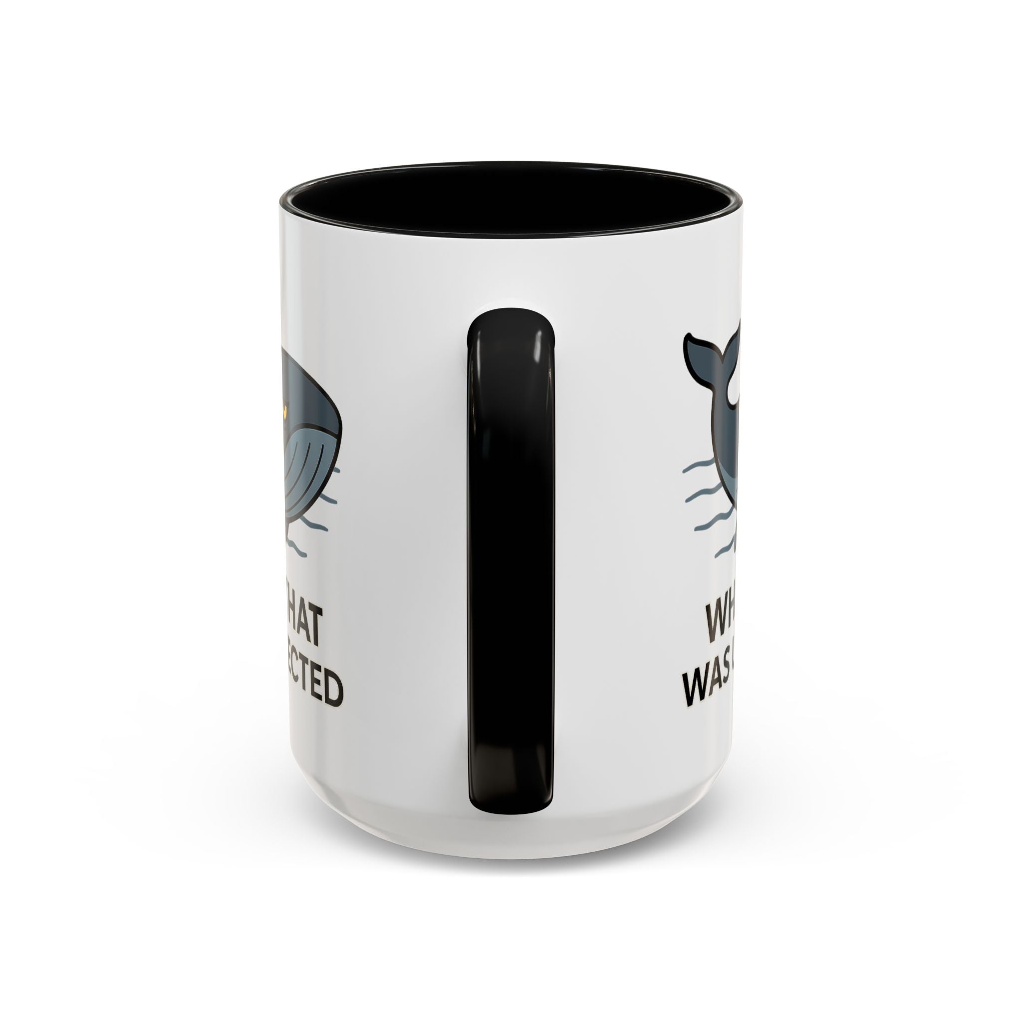 White Mug with black color accent with a blue whale design and text "Whale, that was unexpected" on a white background