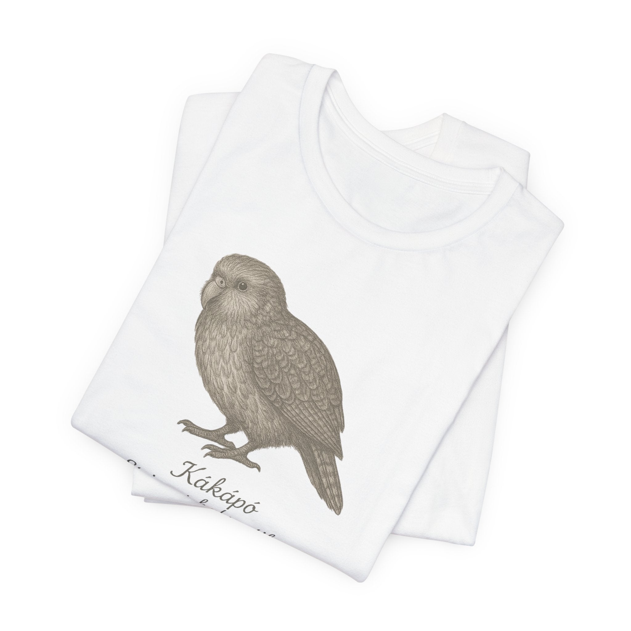 White t-shirt with a kakapo bird graphic and text of its scientific name on a white background
