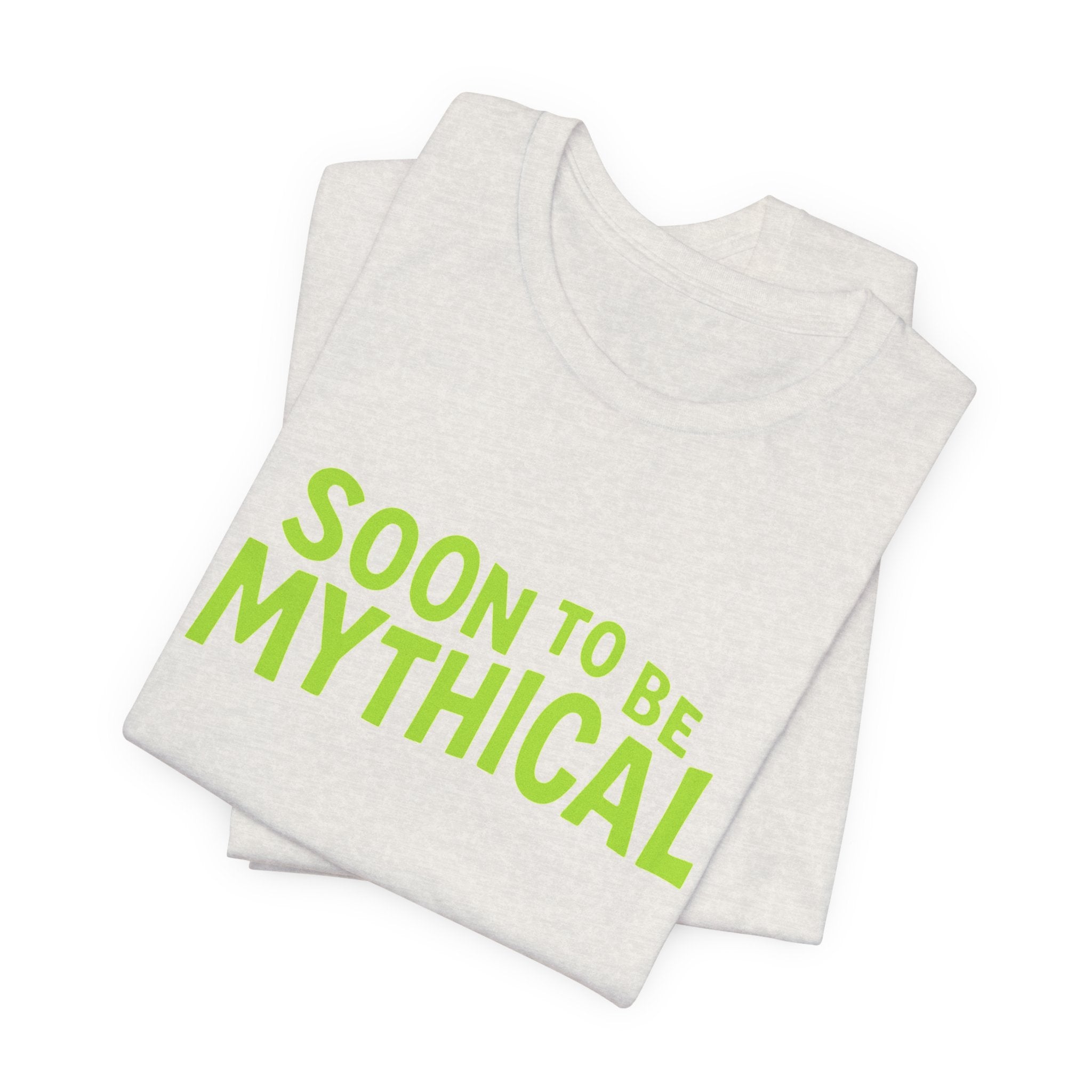 Heather cement t-shirt with 'Soon to be Mythical' text in green on a white background