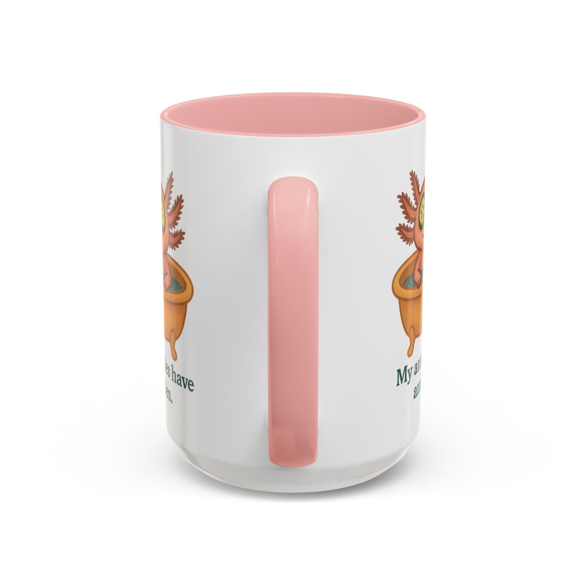 White mug with pink interior and handle color accent featuring a graphic of a cute axolotl taking a relaxing bath with the text "My anxieties have anxieties."