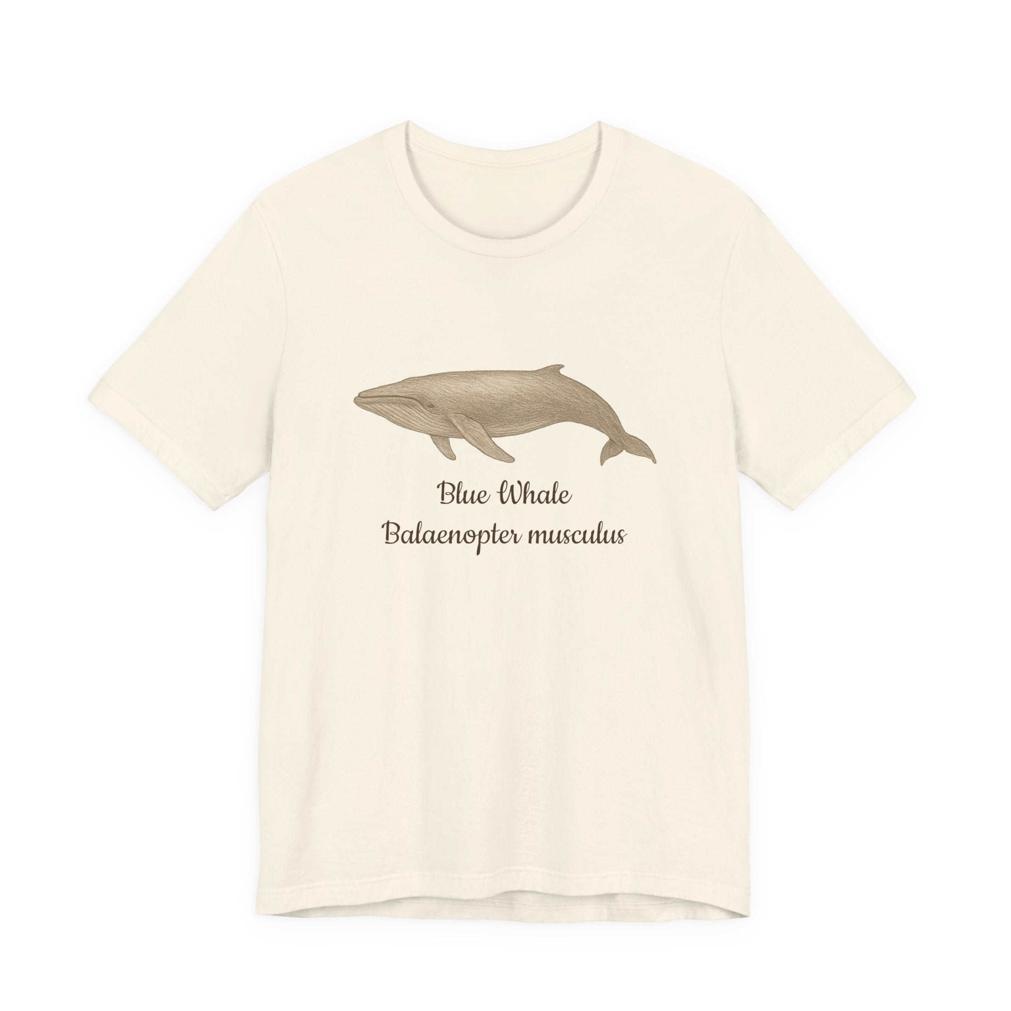 Beige t-shirt with a blue whale graphic and text on a white background