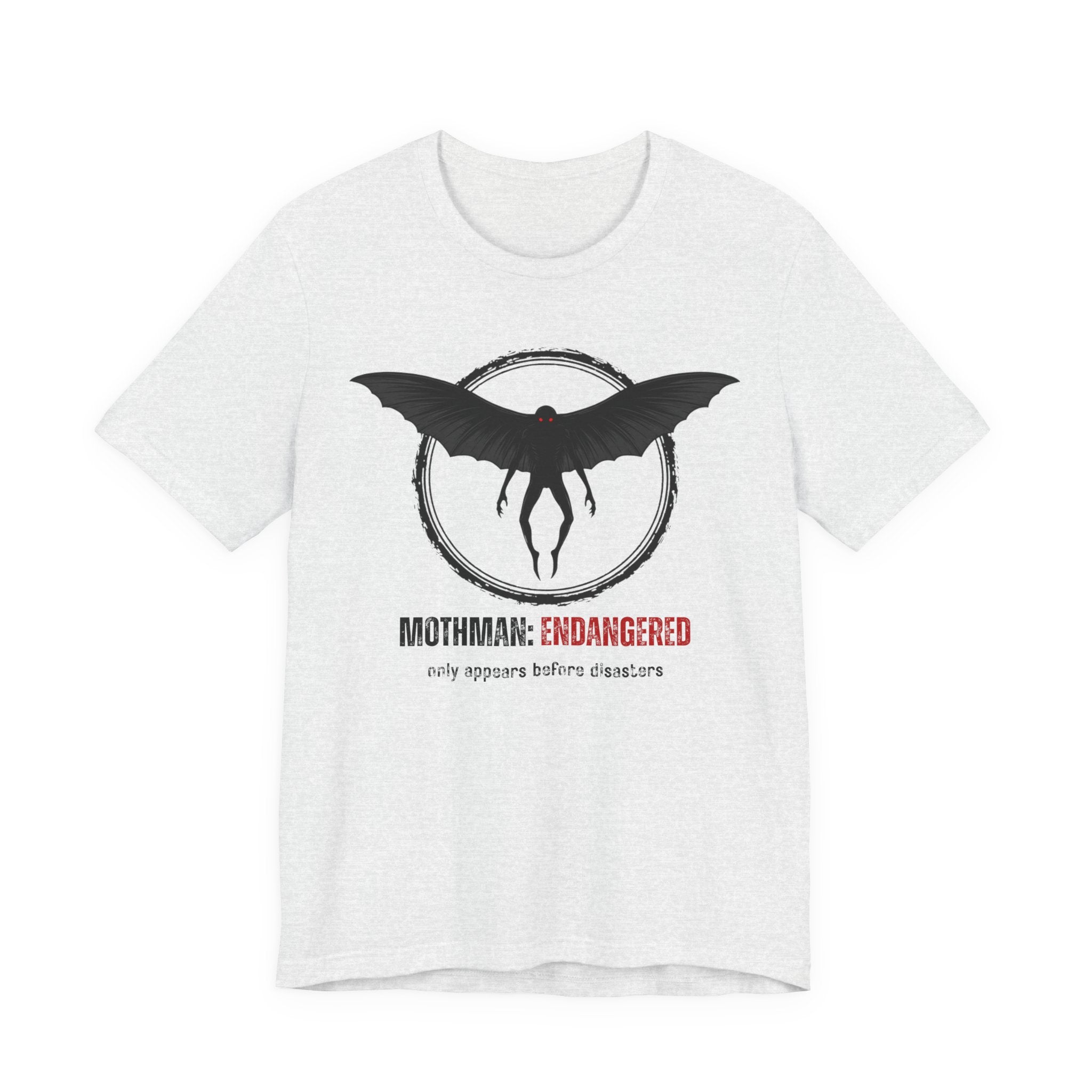 White t-shirt with Mothman graphic and text "Mothman: Endangered - only appears before disasters" by Soon To Be Mythical