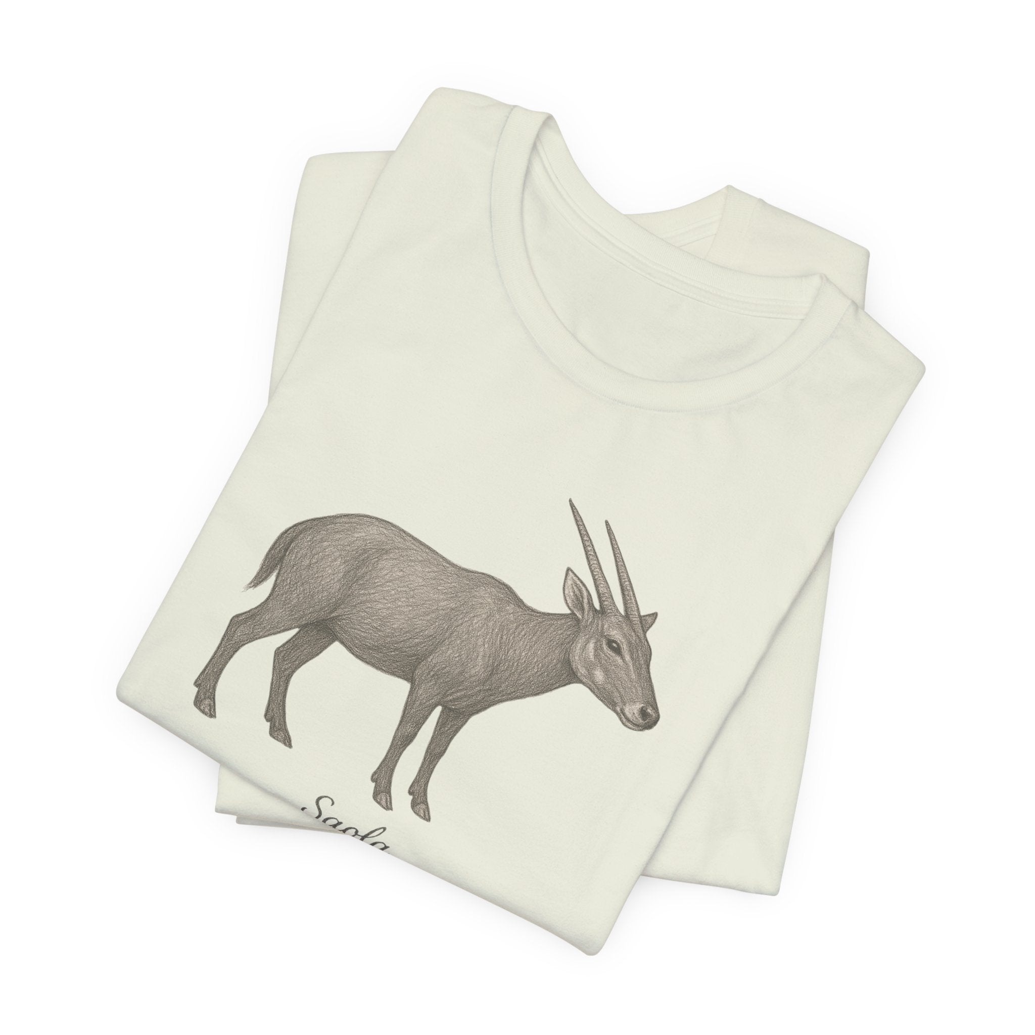 Folded citron t-shirt with a graphic of a saola on a white background