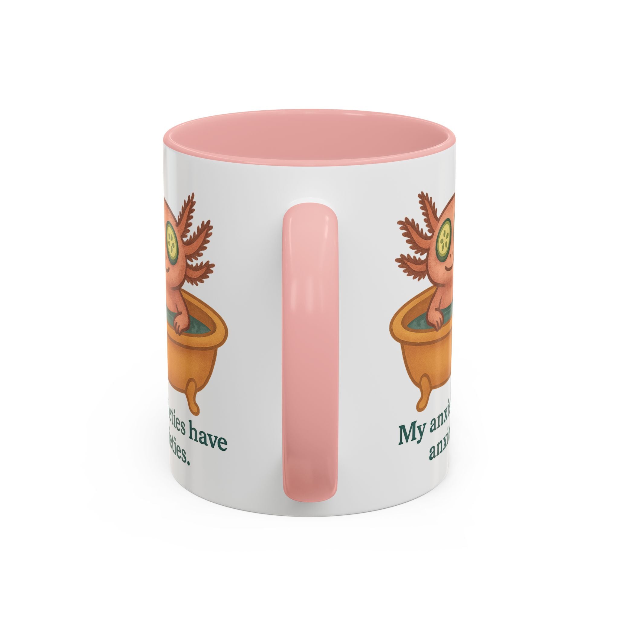 White mug with pink interior and handle color accent featuring a graphic of a cute axolotl taking a relaxing bath with the text "My anxieties have anxieties."