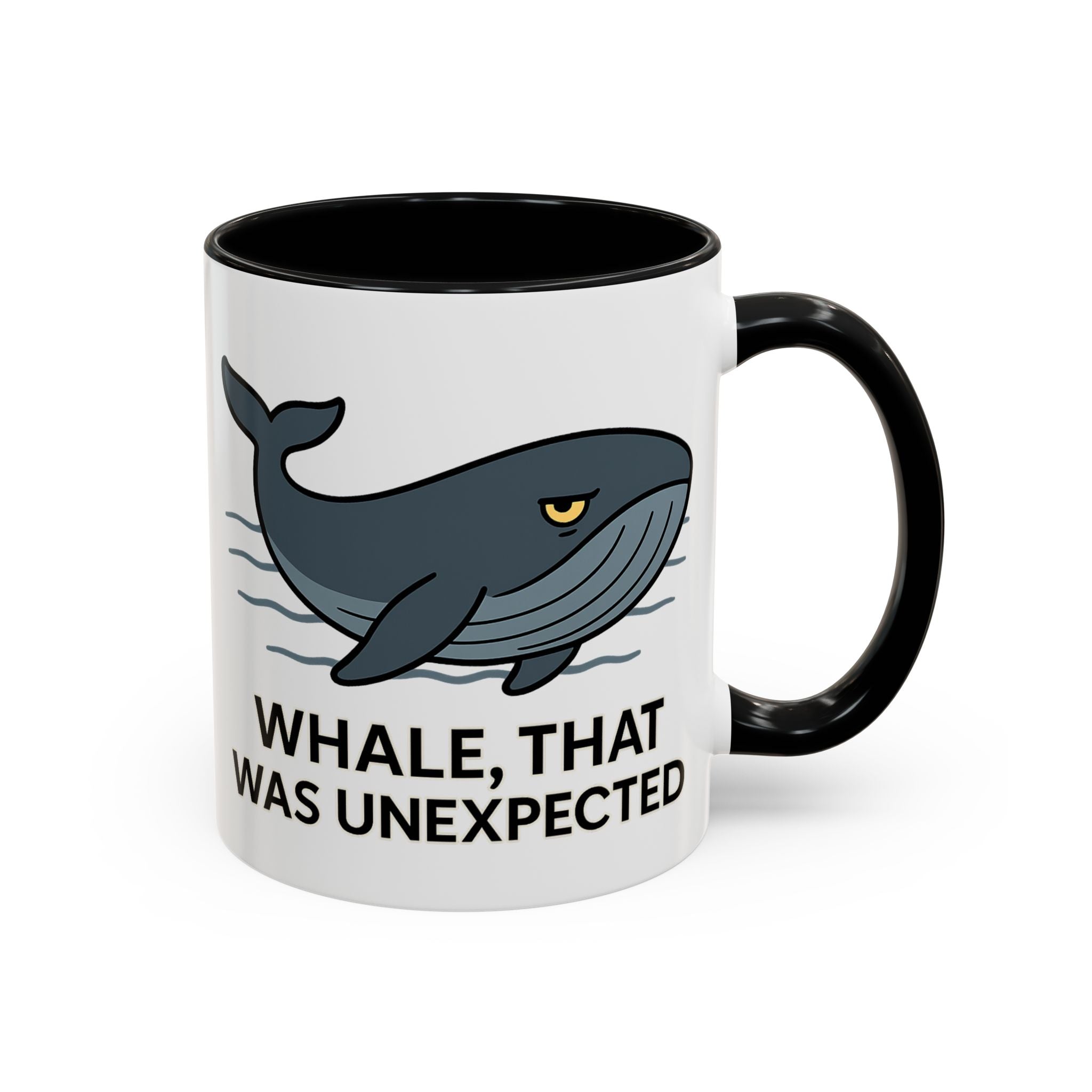 White Mug with black color accent with a blue whale design and text &quot;Whale, that was unexpected&quot; on a white background