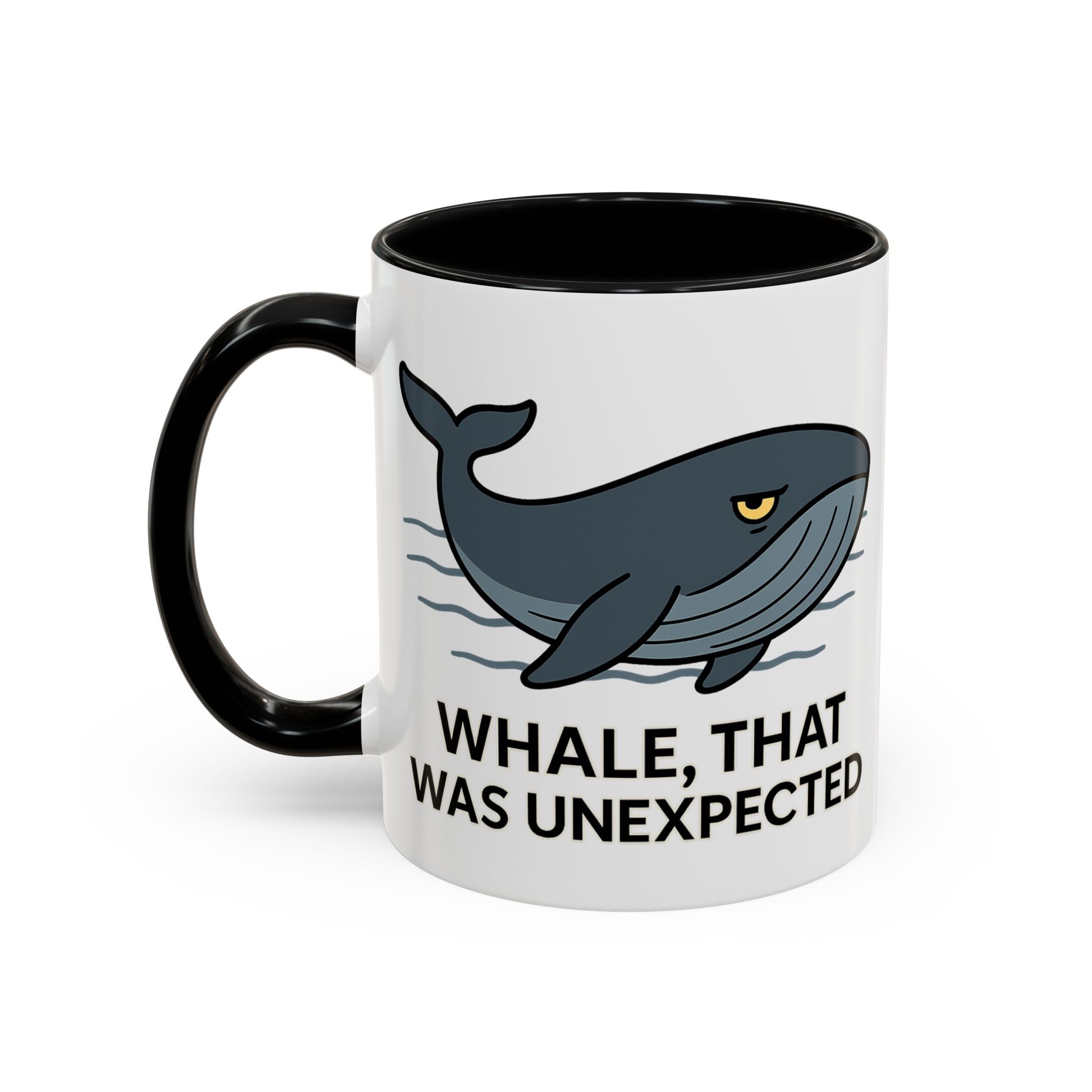 White Mug with black color accent with a blue whale design and text "Whale, that was unexpected" on a white background