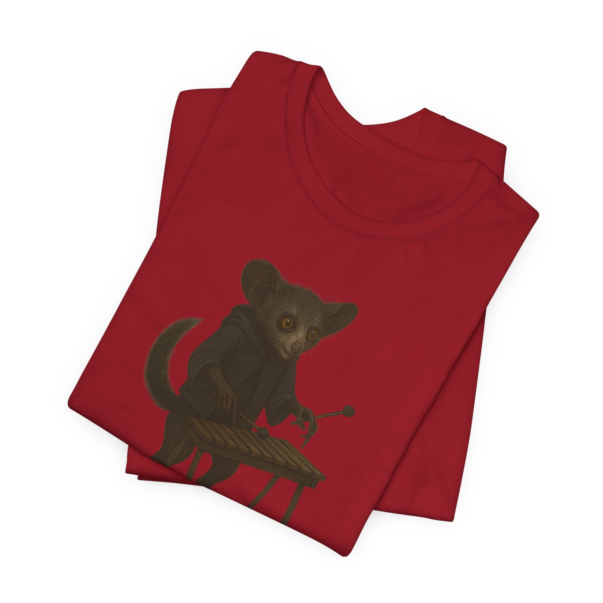 Red t-shirt with a graphic of an aye-aye playing a xylophone on a white background