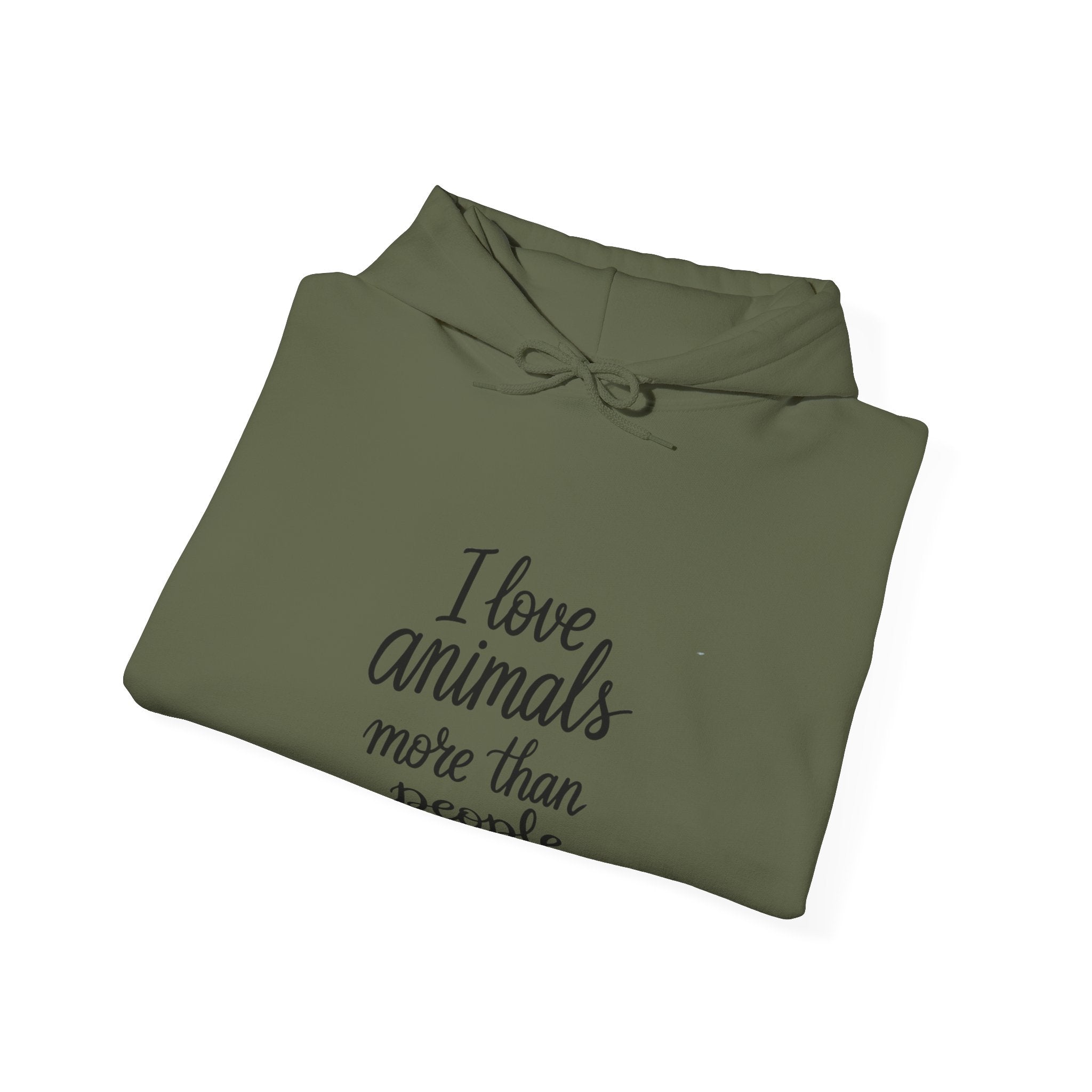 Folded green hoodie with text 'I love animals more than people' by Soon To Be Mythical