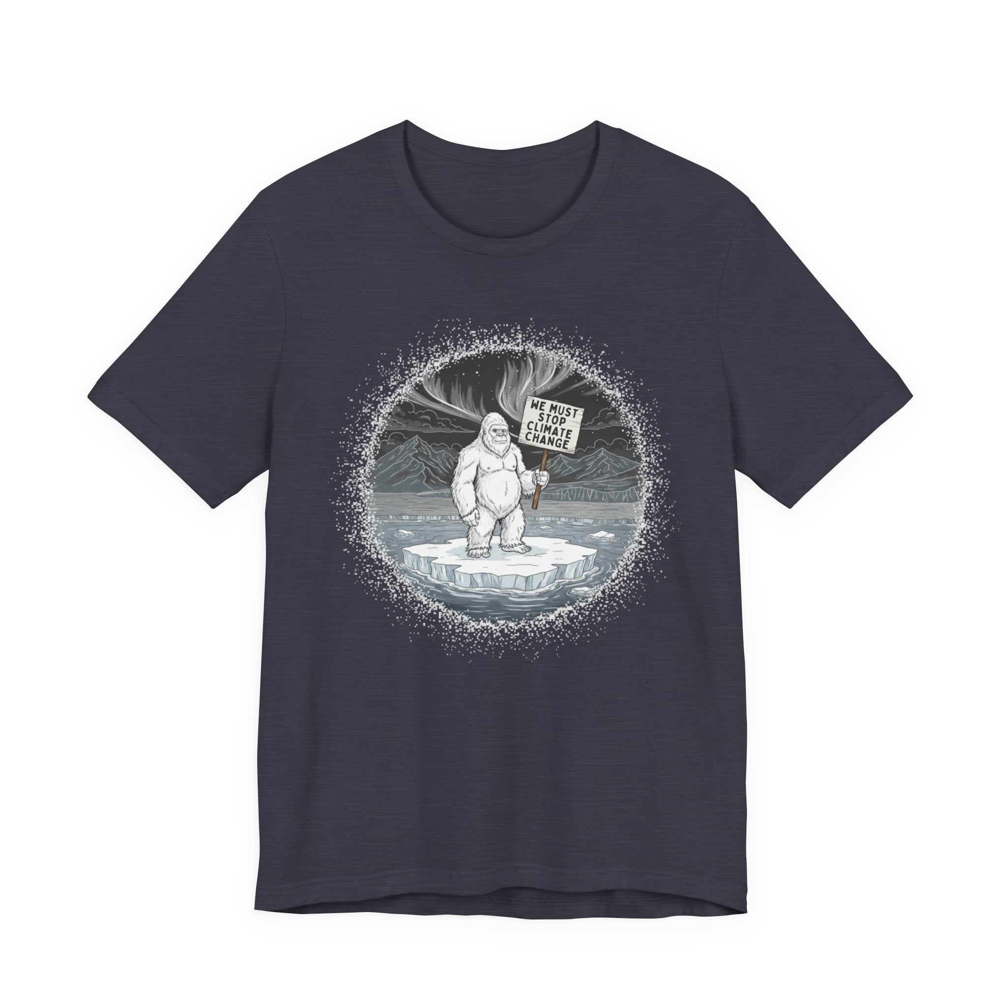 Heather navy t-shirt with a graphic of a Yeti on an ice floe holding a sign with the text "We must stop climate change" by Soon To Be Mythical