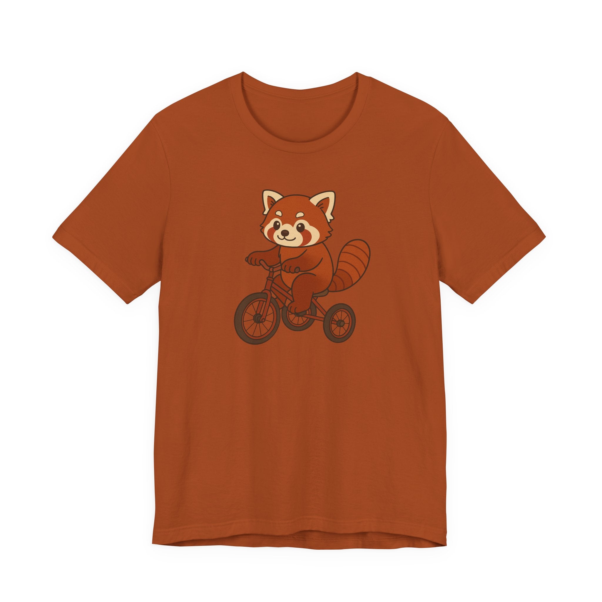 Autumn t-shirt with a red panda riding a tricycle graphic on a white background