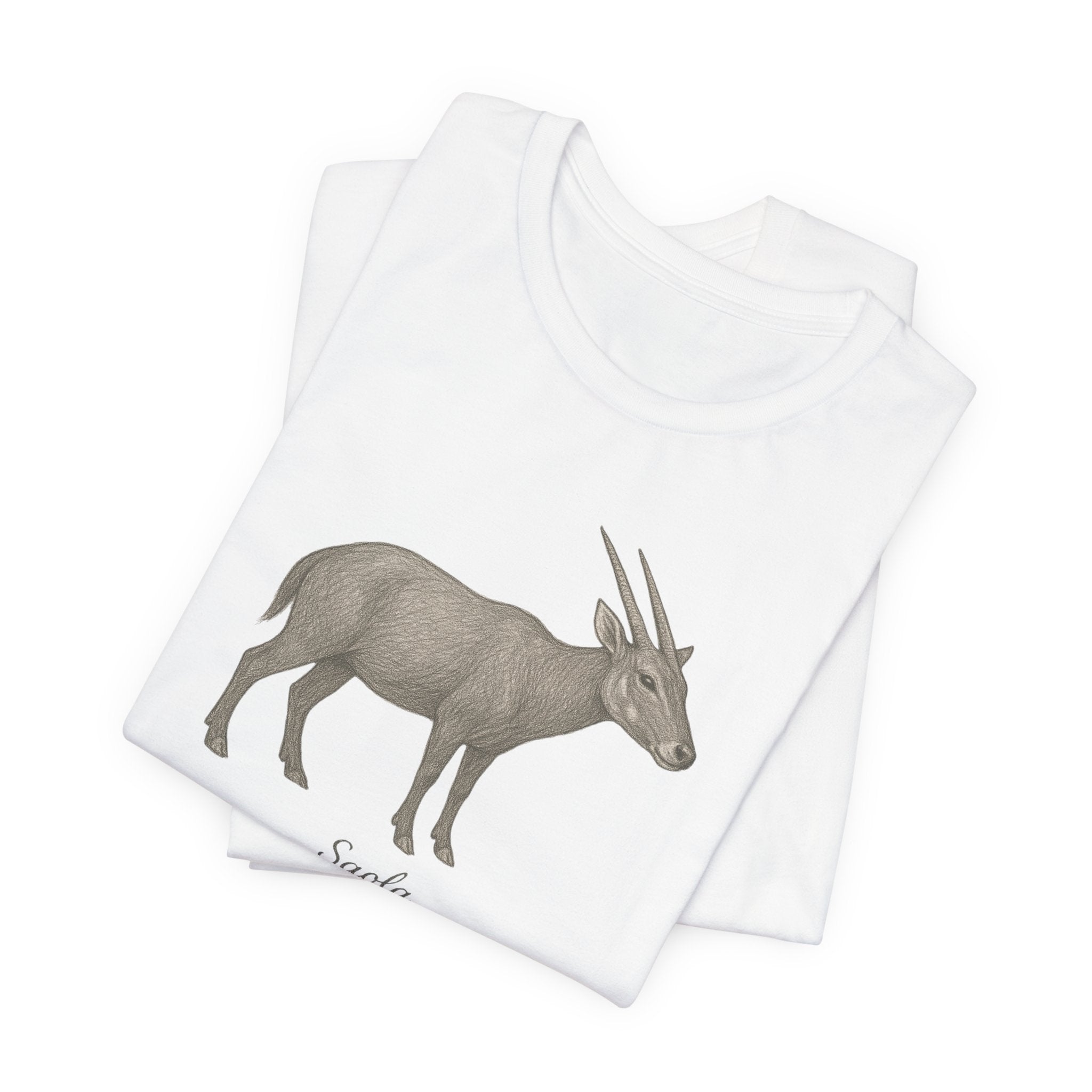 Folded white t-shirt with a saola illustration on a white background