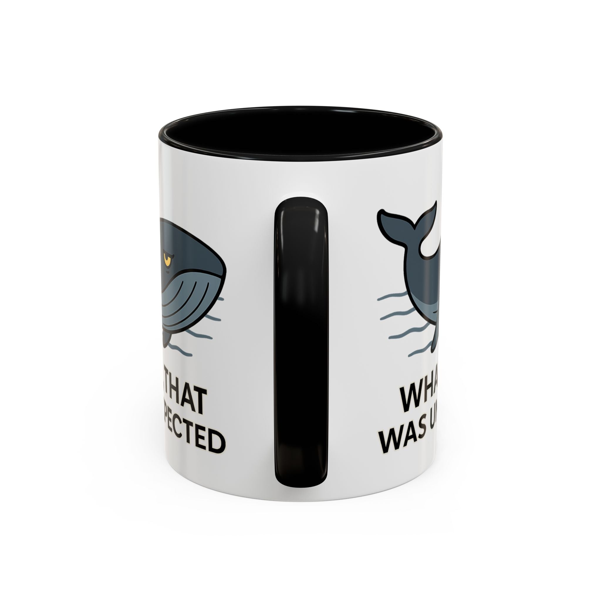 White Mug with black color accent with a blue whale design and text "Whale, that was unexpected" on a white background