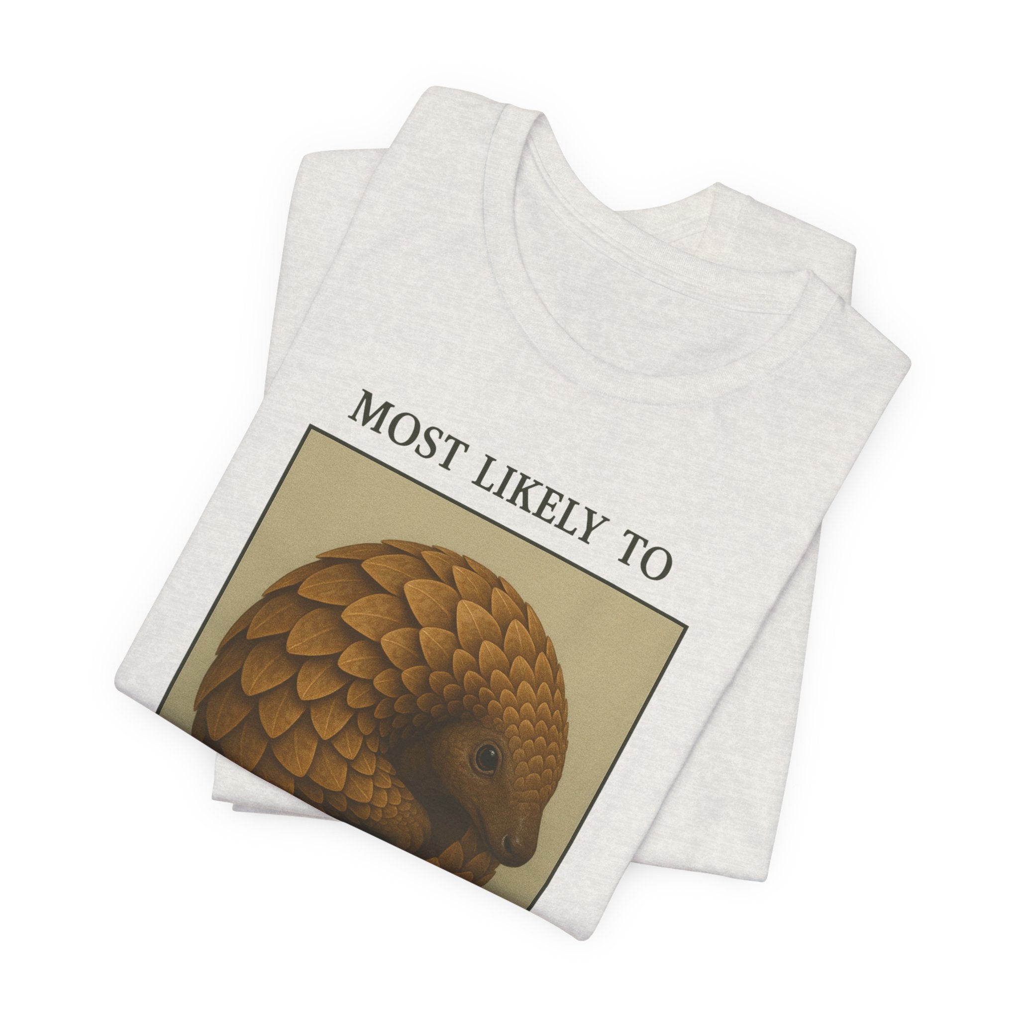Heather Cement t-shirt with a yearbook style photo of a pangolin that says "Most Likely to Turn Into a Pinecone Under Stress"