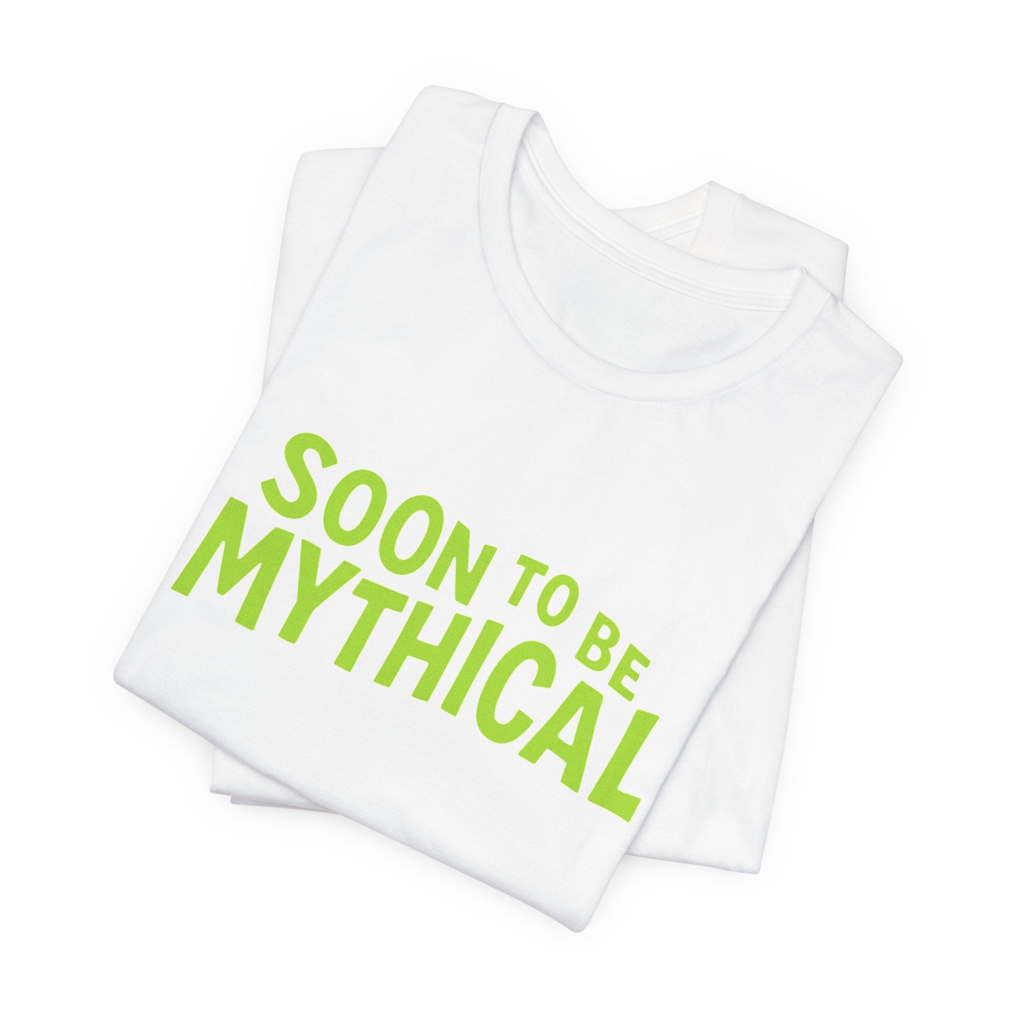 White t-shirt with 'Soon to be Mythical' text in green on a white background