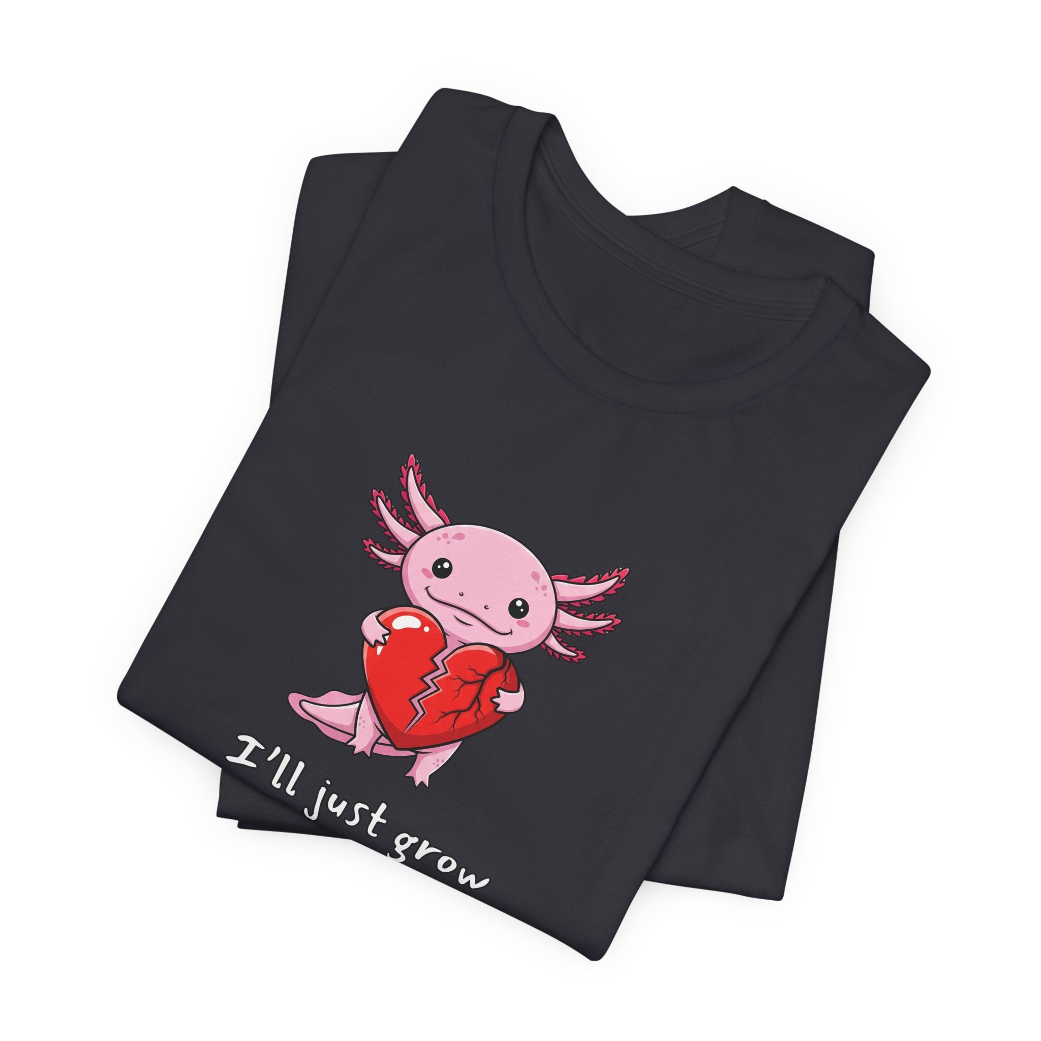 Dark gray t-shirt with axolotl graphic with a broken heart and text "I'll just grow a new one" by Soon To Be Mythical