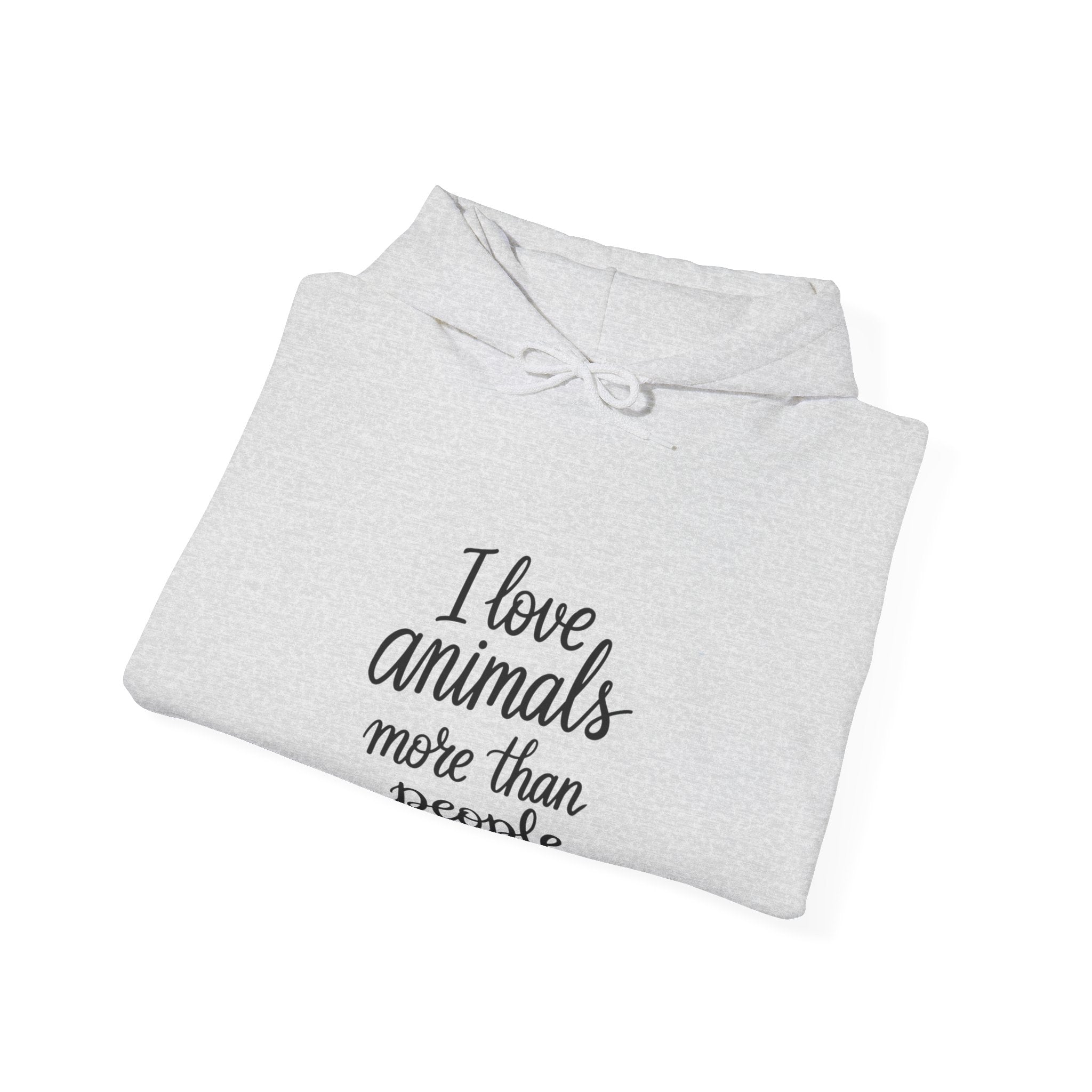 Folded gray hoodie with text 'I love animals more than people' by Soon To Be Mythical