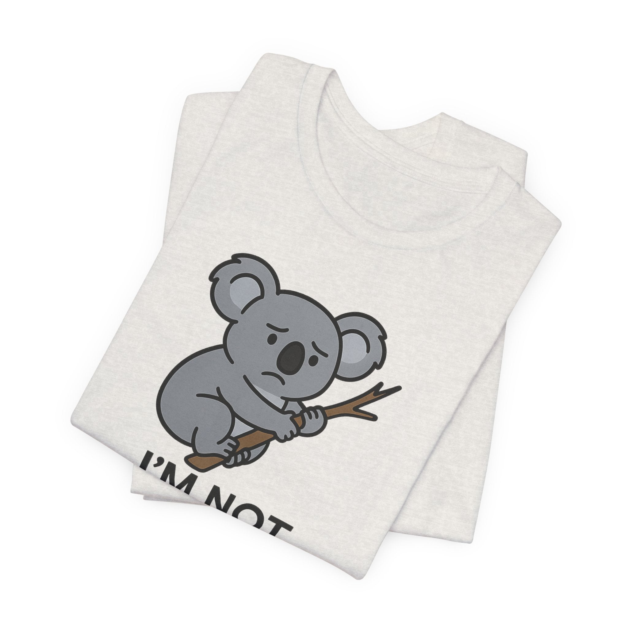 Heather cement t-shirt with a koala graphic and text "I'm not koala-fied for this" on a white background