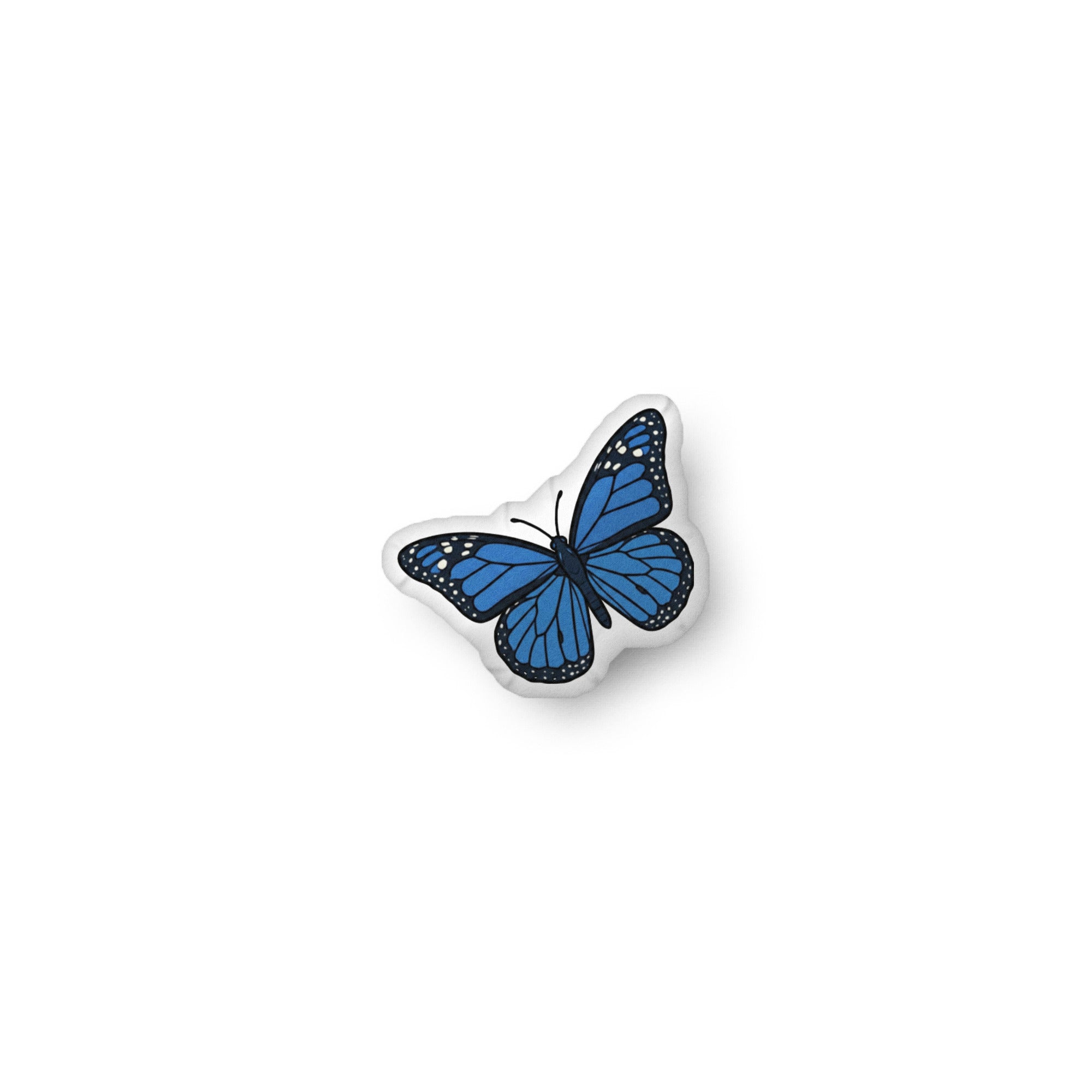 Sapphire Butterfly illustration on a shaped pillow by Soon To Be Mythical