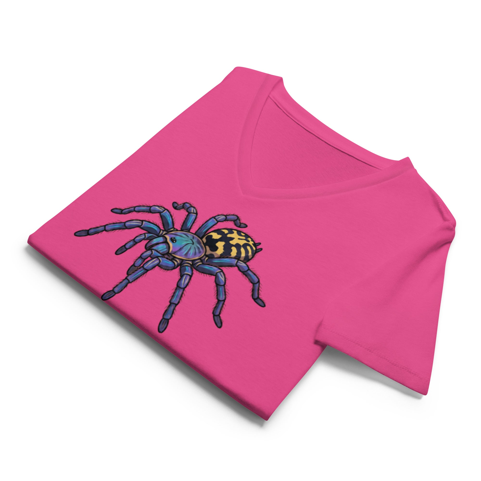 Folded pink v-neck t-shirt with a Psychadelic earth tiger spider graphic by Soon To Be Mythical