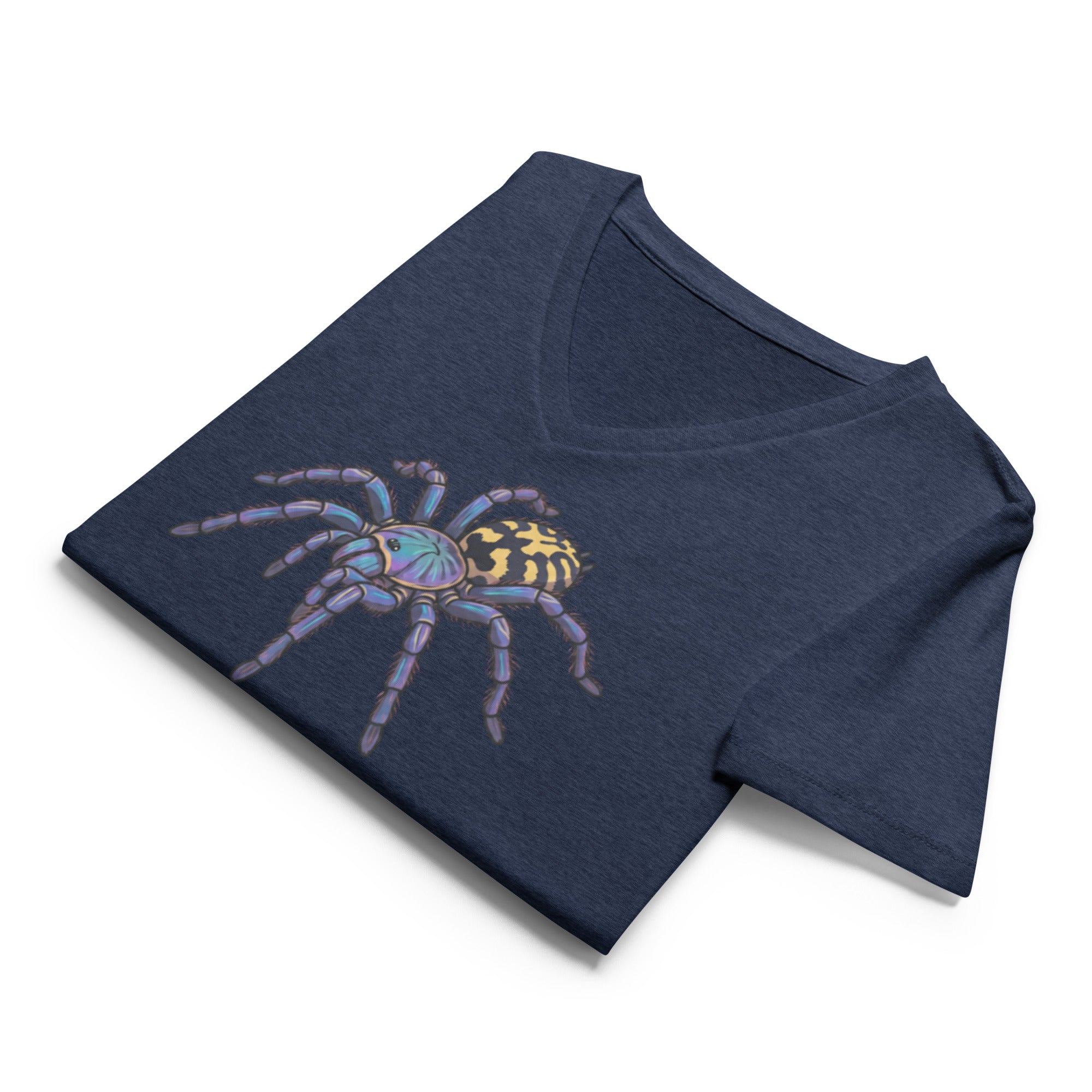 Folded navy blue v-neck t-shirt with a Psychadelic earth tiger spider graphic by Soon To Be Mythical