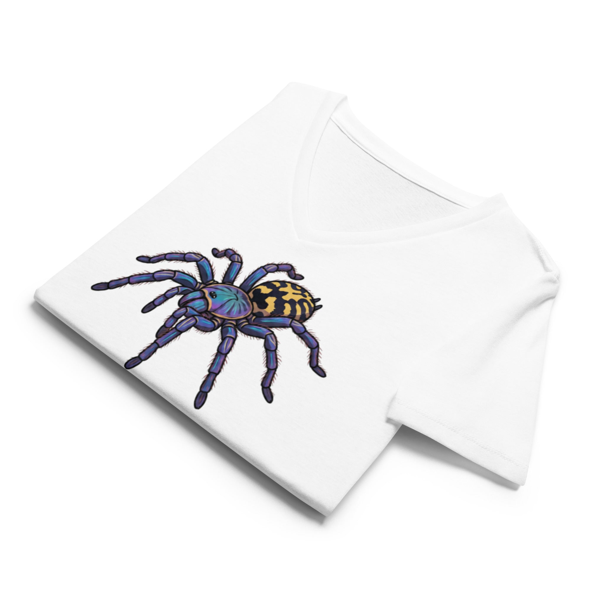 Folded white v-neck t-shirt with a Psychadelic earth tiger spider graphic by Soon To Be Mythical